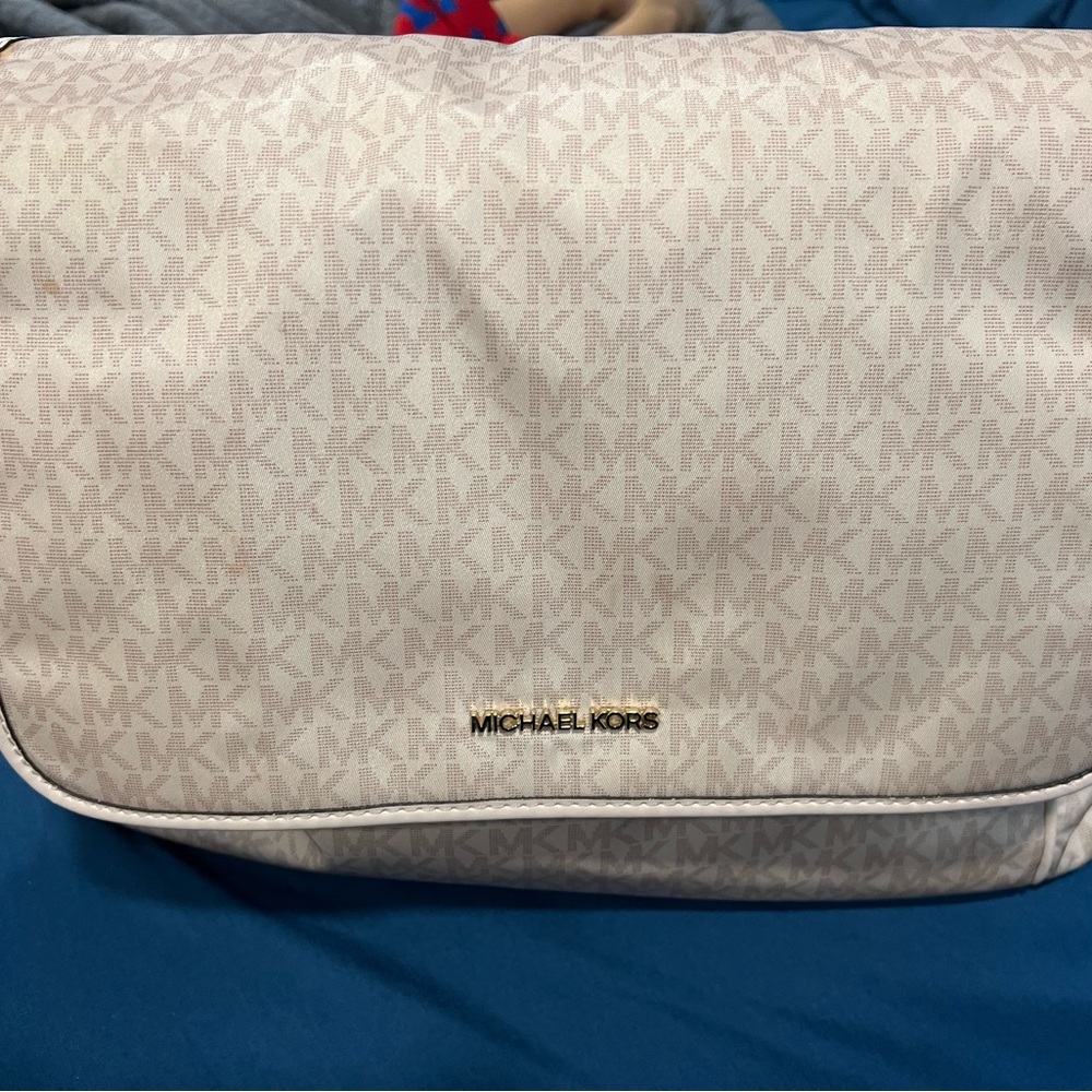 Michael Kors pink diaper bag with changing pad included. True diaper bag